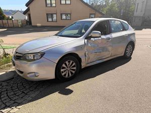 Beschädigte Fahrzeugseite